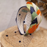 Diadema de Plumas Sarita