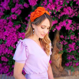 Diadema arrugada marina naranja para invitada